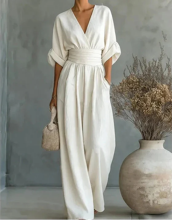 Dorothée | Combinaison pantalon blanche à col en V et ceinture drapée